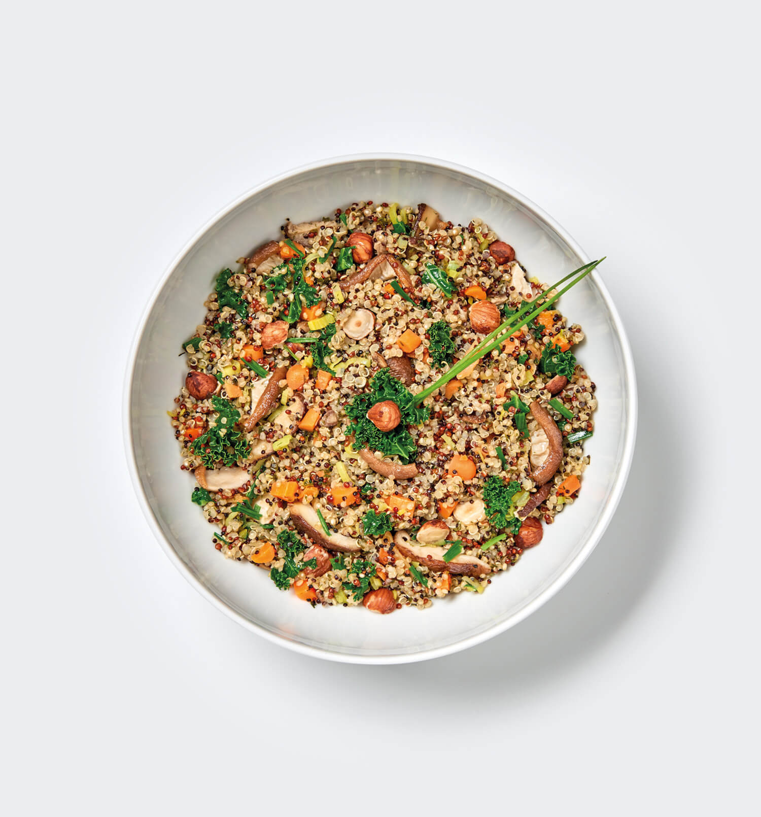 Tricolor quinoa with shiitake mushrooms and hazelnuts Trevijano